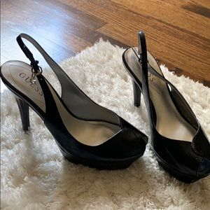 Black guess patent leather heels